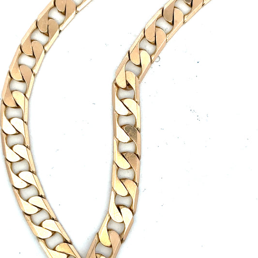 9ct yellow gold curb bracelet with a polished finish, weighing 14.5 grams, featuring classic linked design.