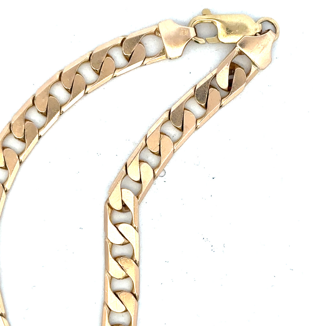 9ct yellow gold curb bracelet with a polished finish, weighs 14.5g, featuring classic linked design.