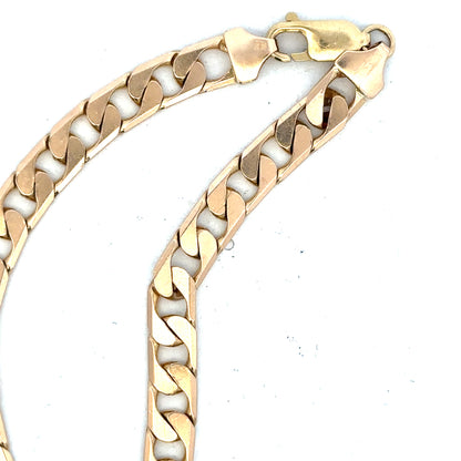 9ct yellow gold curb bracelet with a polished finish, weighs 14.5g, featuring classic linked design.