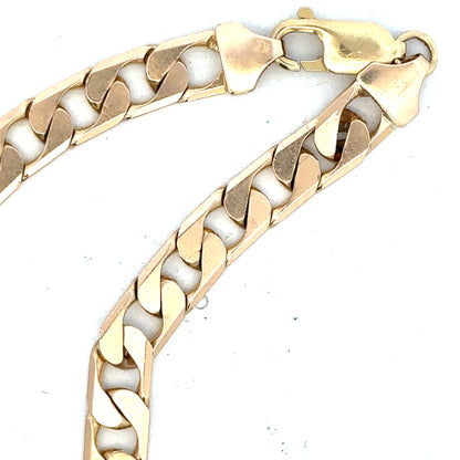 9ct yellow gold curb bracelet weighing 14.5g, unbranded, with a classic chain design, shown on a neutral background.