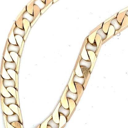 9ct yellow gold curb bracelet showing polished links, weight 14.5g, unbranded jewelry accessory.