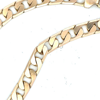 9ct yellow gold curb bracelet weighing 14.5g with a polished finish, unbranded jewelry accessory featuring linked gold curb chain.