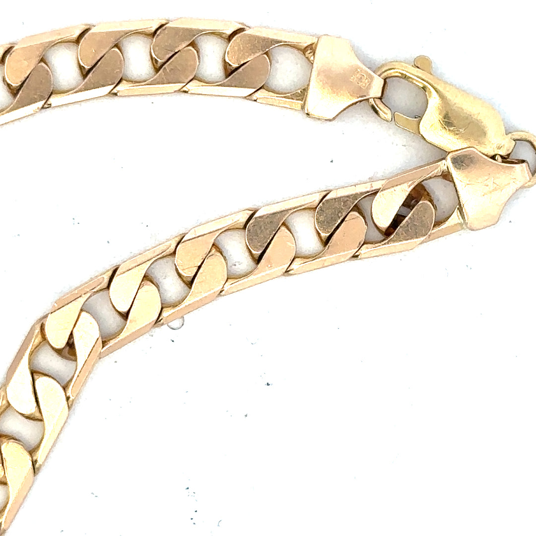 9ct yellow gold curb bracelet weighing 14.5g, featuring classic linked chain design, unbranded jewelry accessory.