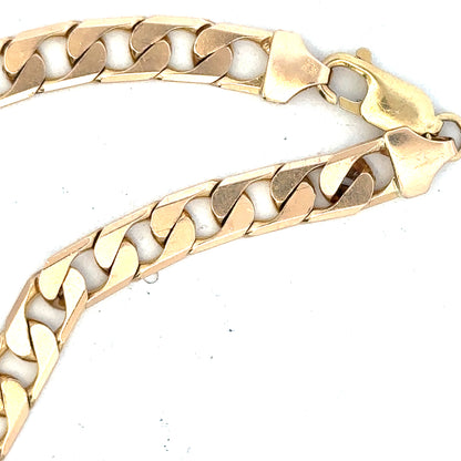 9ct yellow gold curb bracelet weighing 14.5g, featuring classic linked chain design, unbranded jewelry accessory.