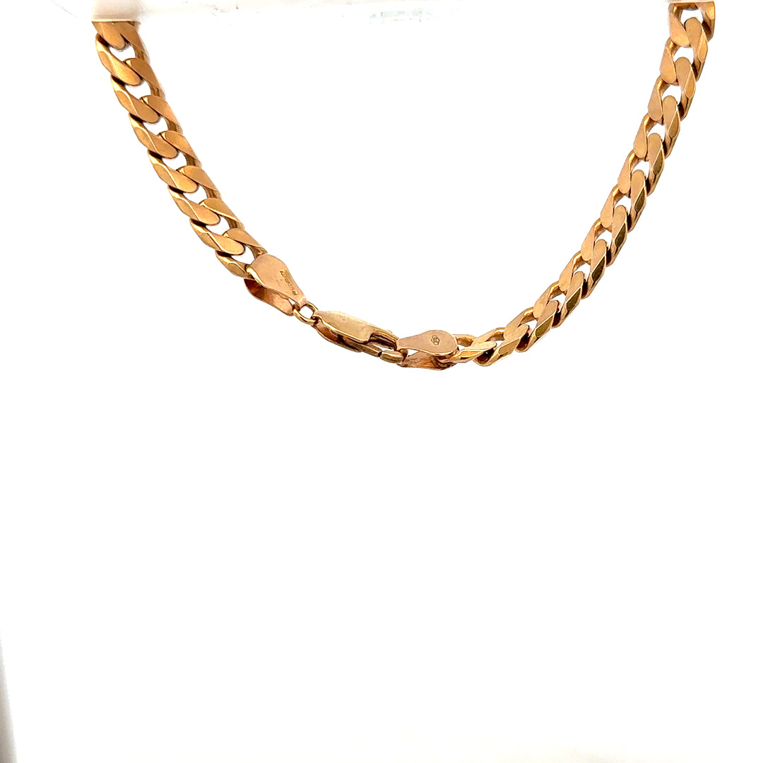 9ct yellow gold curb bracelet with a smooth chain design and polished finish, weighing 17.1 grams.