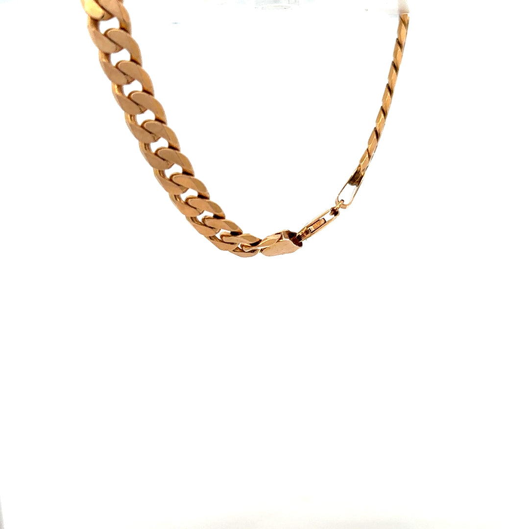 9ct yellow gold curb bracelet weighing 17.1g, unbranded, showcasing linked gold chain design on a plain background.