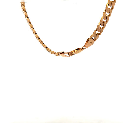 9ct yellow gold curb bracelet with a polished finish, lightweight design, and secure clasp, weighing 17.1 grams.