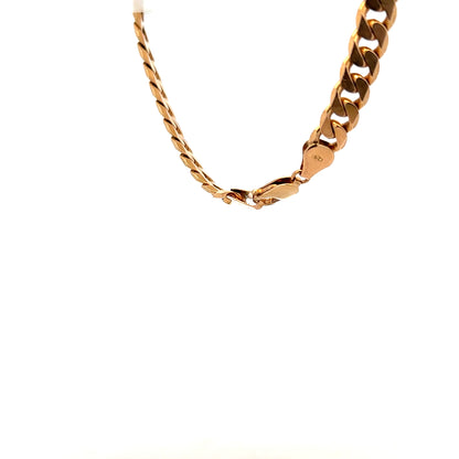 9ct yellow gold curb bracelet with a polished finish, featuring linked flat rectangular links, weighing 17.1g.