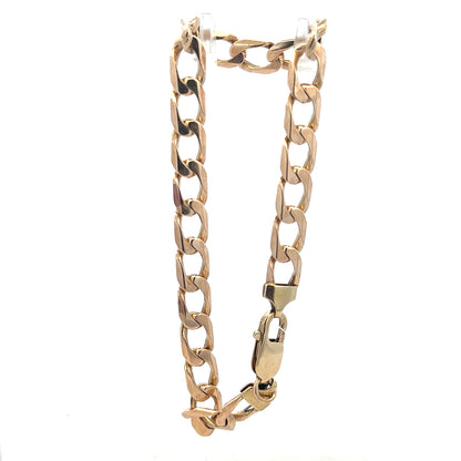 9ct yellow gold curb bracelet with an 18.3g weight, featuring a classic chain design, unbranded jewelry accessory.