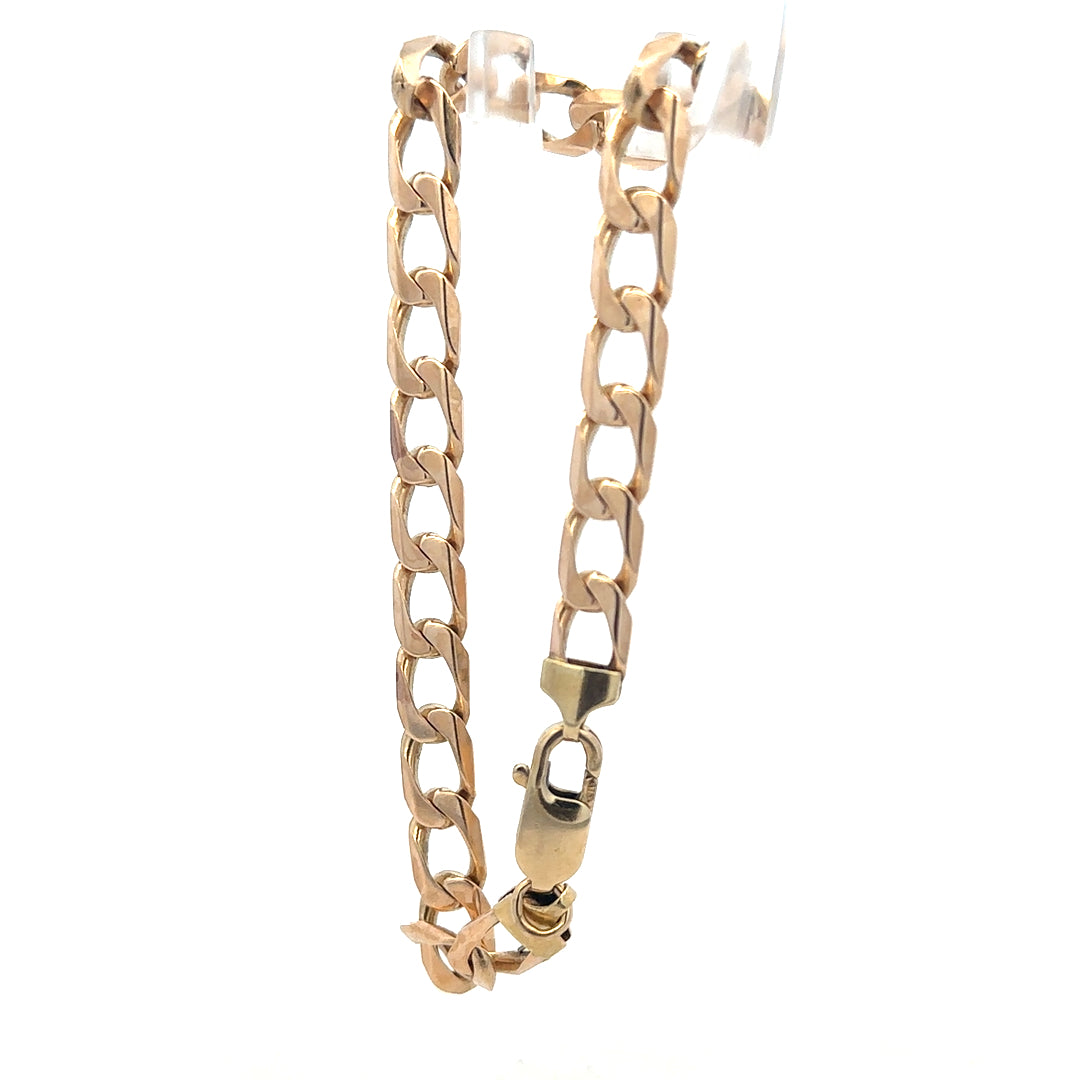9ct yellow gold curb bracelet with textured links, weighing 18.3 grams, unbranded jewelry accessory displayed in the image.