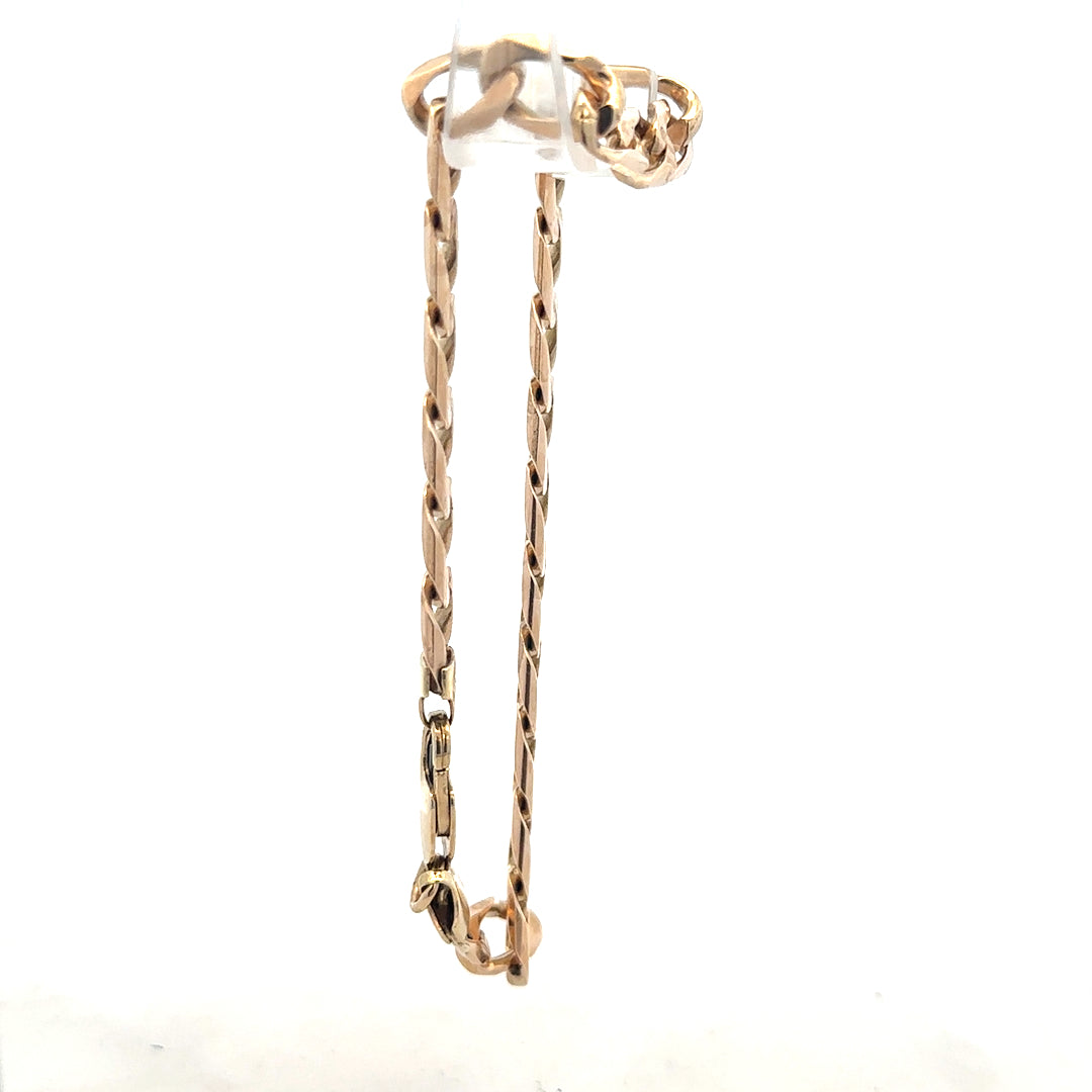 9ct yellow gold curb bracelet weighing 18.3g, unbranded jewelry with a classic chain design and secure clasp.