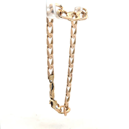 9ct yellow gold curb bracelet weighing 18.3g, unbranded jewelry with classic chain links, shown in a detailed product image.