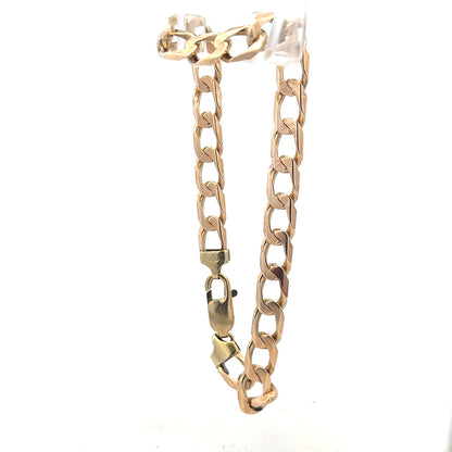 9ct yellow gold curb bracelet with a sleek chain design, weighing 18.3 grams, unbranded jewelry piece.