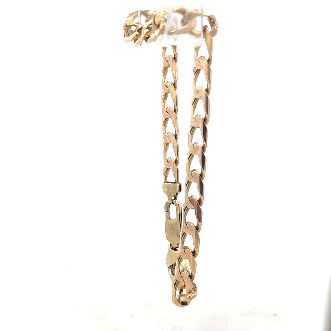 9ct yellow gold curb bracelet, unbranded, with a sturdy chain design and weight of 18.3 grams.