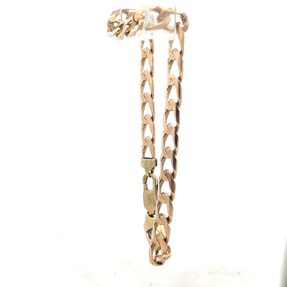 9ct yellow gold curb bracelet, unbranded, with a sturdy chain design and weight of 18.3 grams.