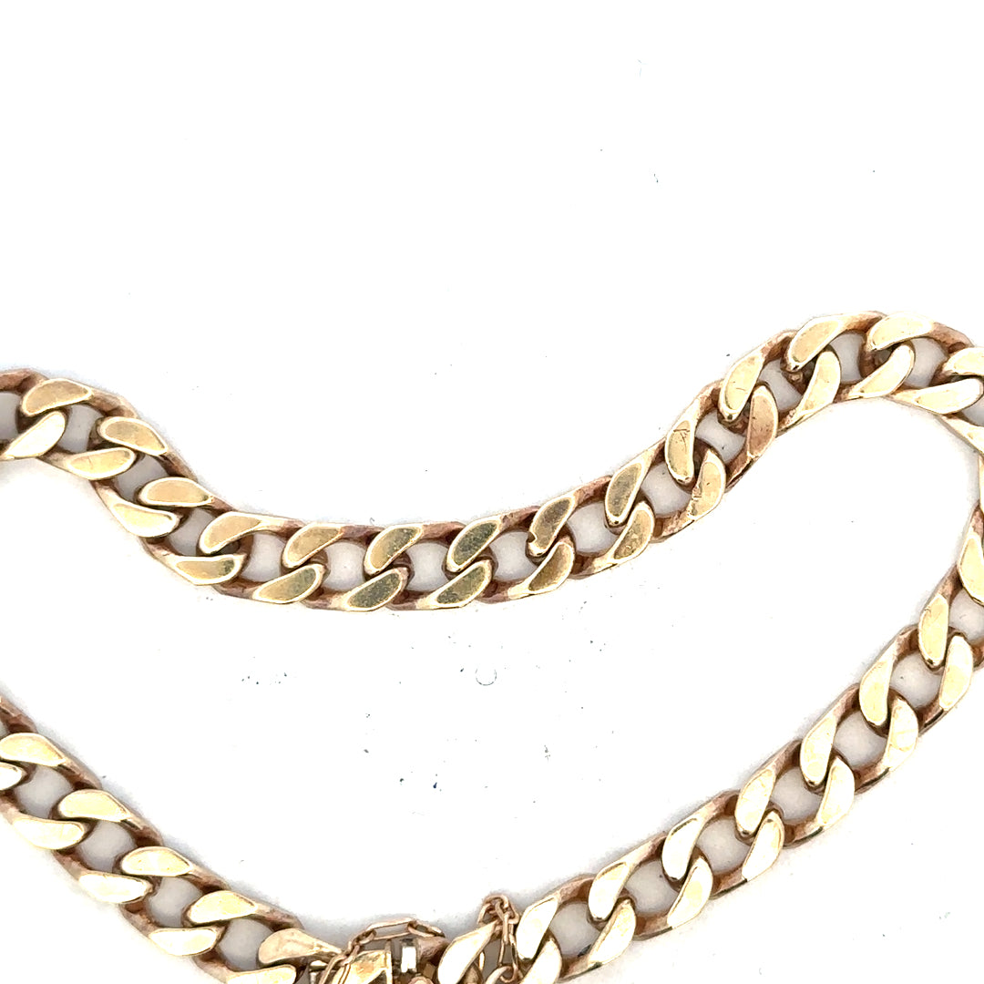 Unbranded 9ct yellow gold curb bracelet 20g, featuring classic linked chain design, displayed on a plain background.