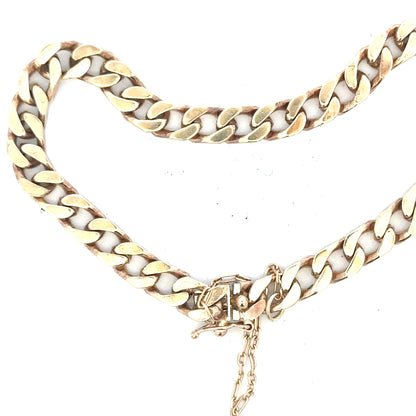 9ct yellow gold curb bracelet with a 20g weight, unbranded, featuring classic chain links, shown in a close-up image.