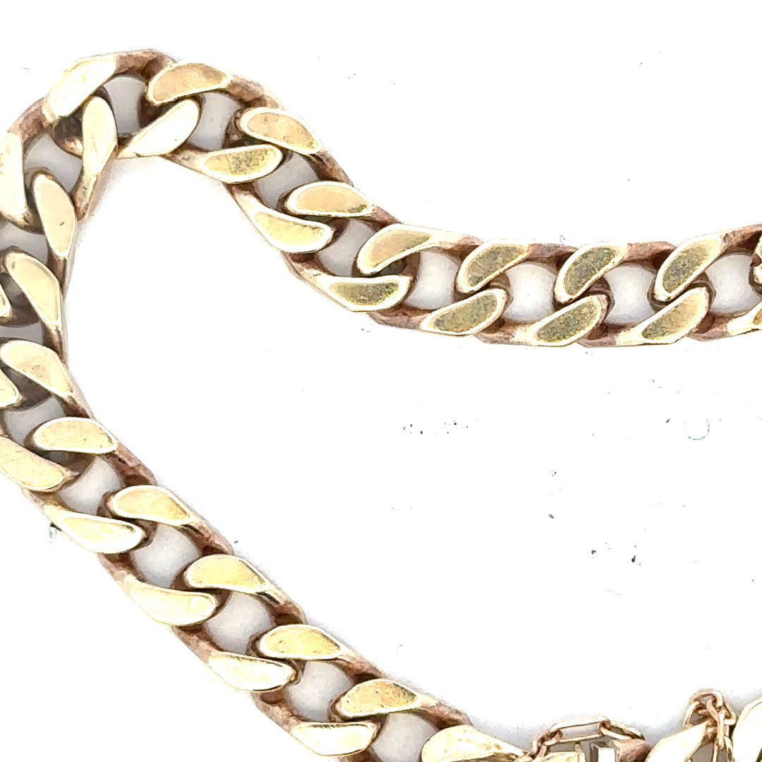 9ct yellow gold curb bracelet with a 20g weight, featuring a classic linked chain design, unbranded jewelry piece.