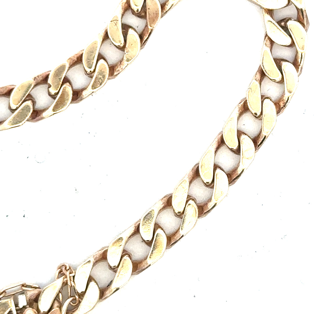 9ct yellow gold curb bracelet weighing 20g, shown with linked chain design on a neutral background.