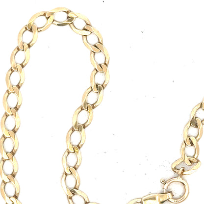 9ct yellow gold curb bracelet weighing 3.9g, unbranded, with classic linked chain design, displayed against a neutral background.