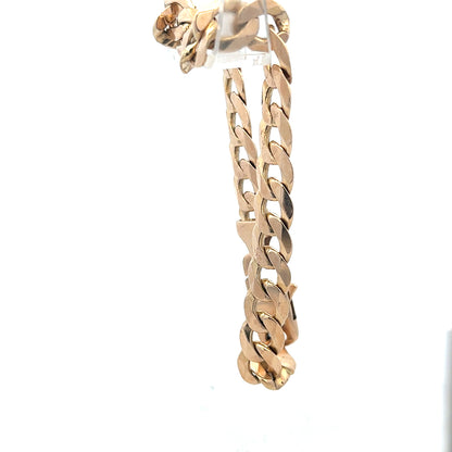 9ct yellow gold curb bracelet weighing 31.9g, showcasing a classic chain design and polished finish.