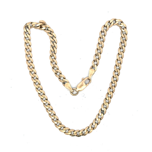 9ct yellow gold curb bracelet weighing 5.2g, showcasing a classic linked chain design with a polished finish.