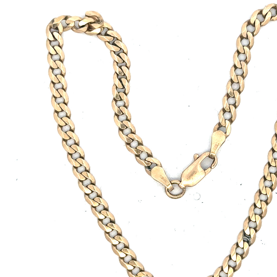 9ct yellow gold curb bracelet weighing 5.2g, unbranded jewelry with classic chain design and polished finish.