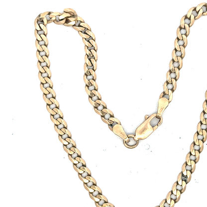 9ct yellow gold curb bracelet weighing 5.2g, unbranded jewelry with classic chain design and polished finish.