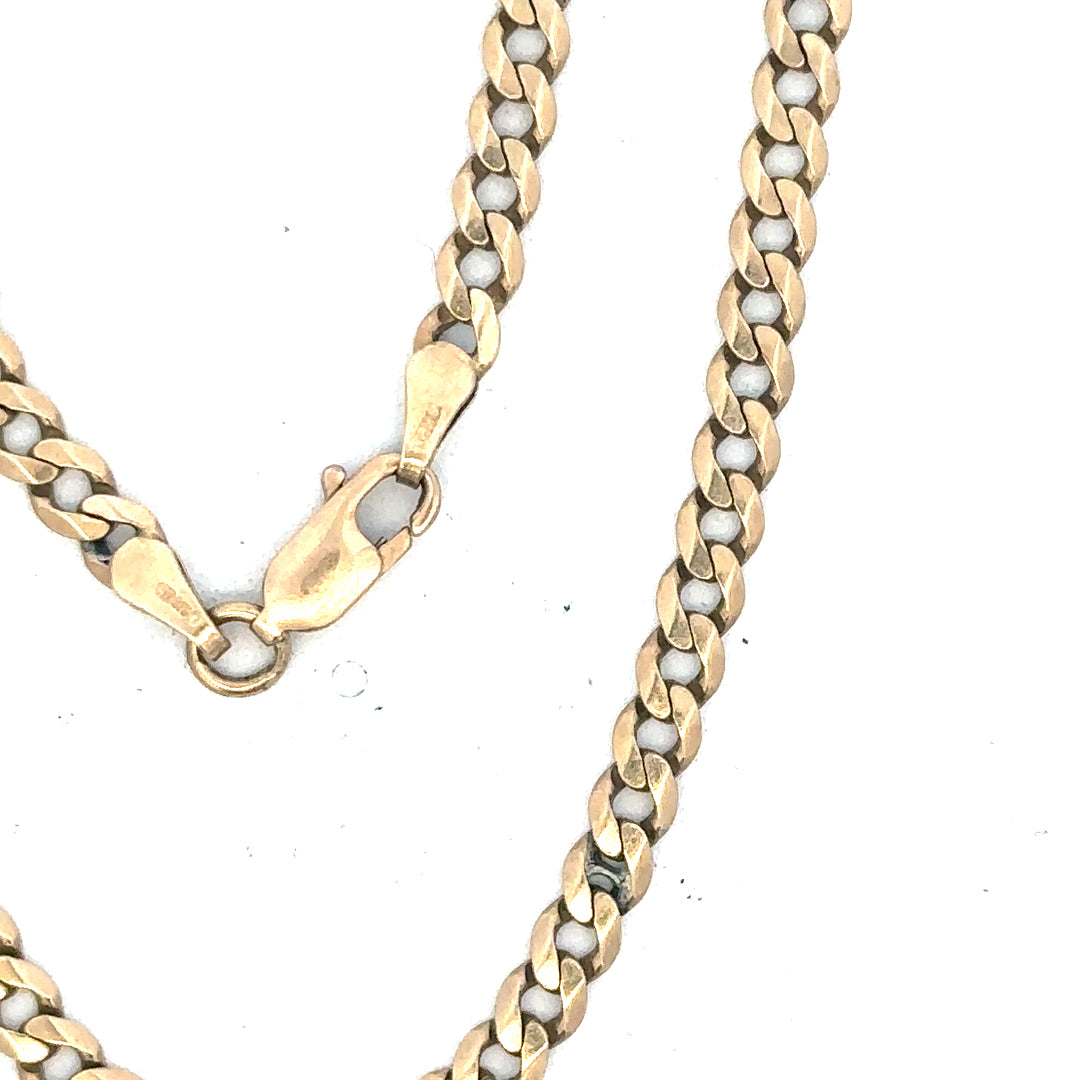 9ct yellow gold curb bracelet weighing 5.2g, unbranded, featuring classic chain links, shown on a plain background.