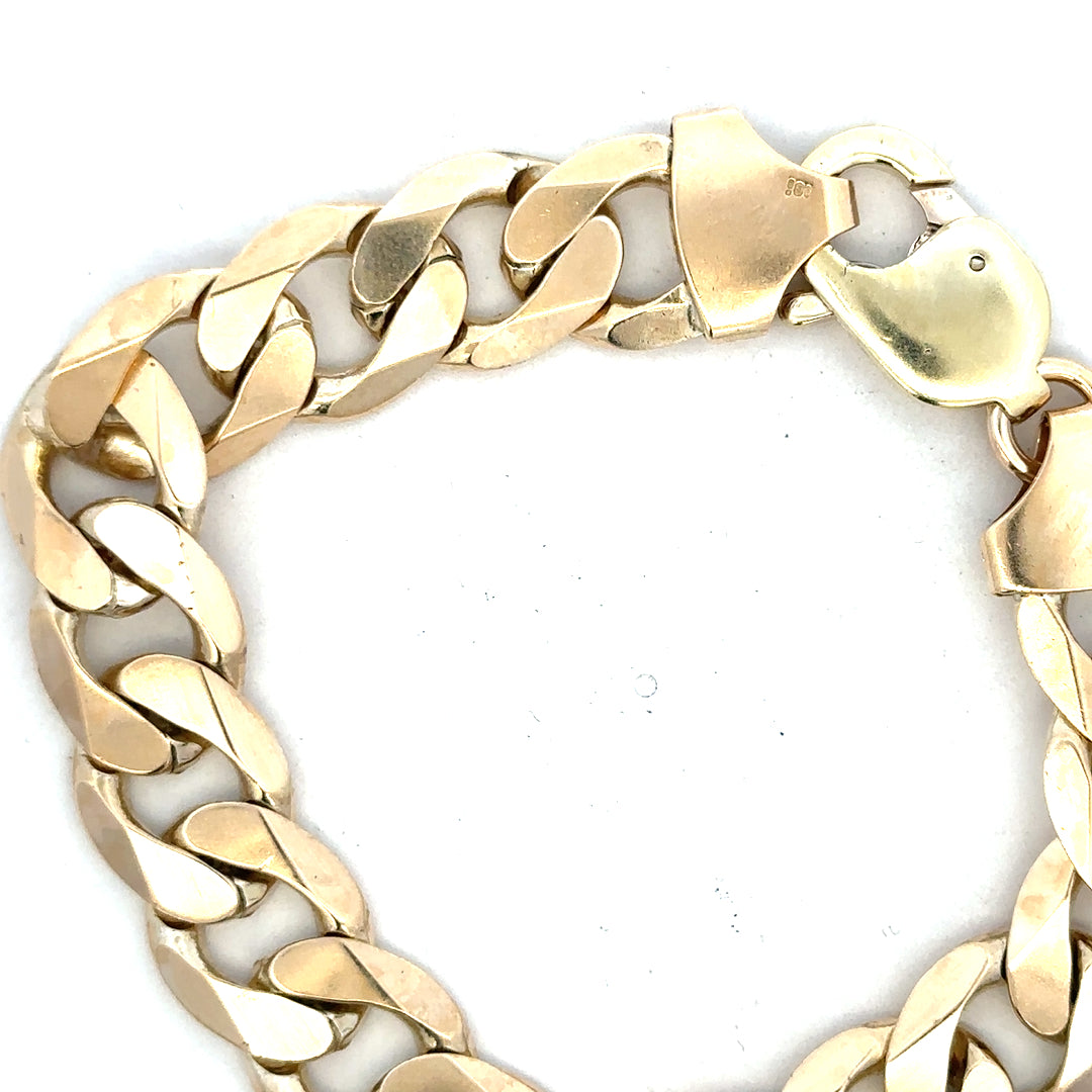 9ct yellow gold curb bracelet weighing 55g with a classic chain design, unbranded jewelry piece for stylish wear