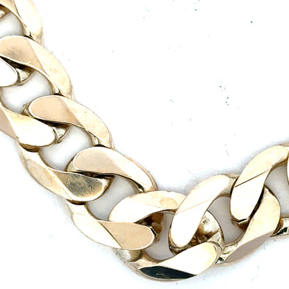 9ct yellow gold curb bracelet, unbranded, with a 55g weight, featuring classic linked chain design.