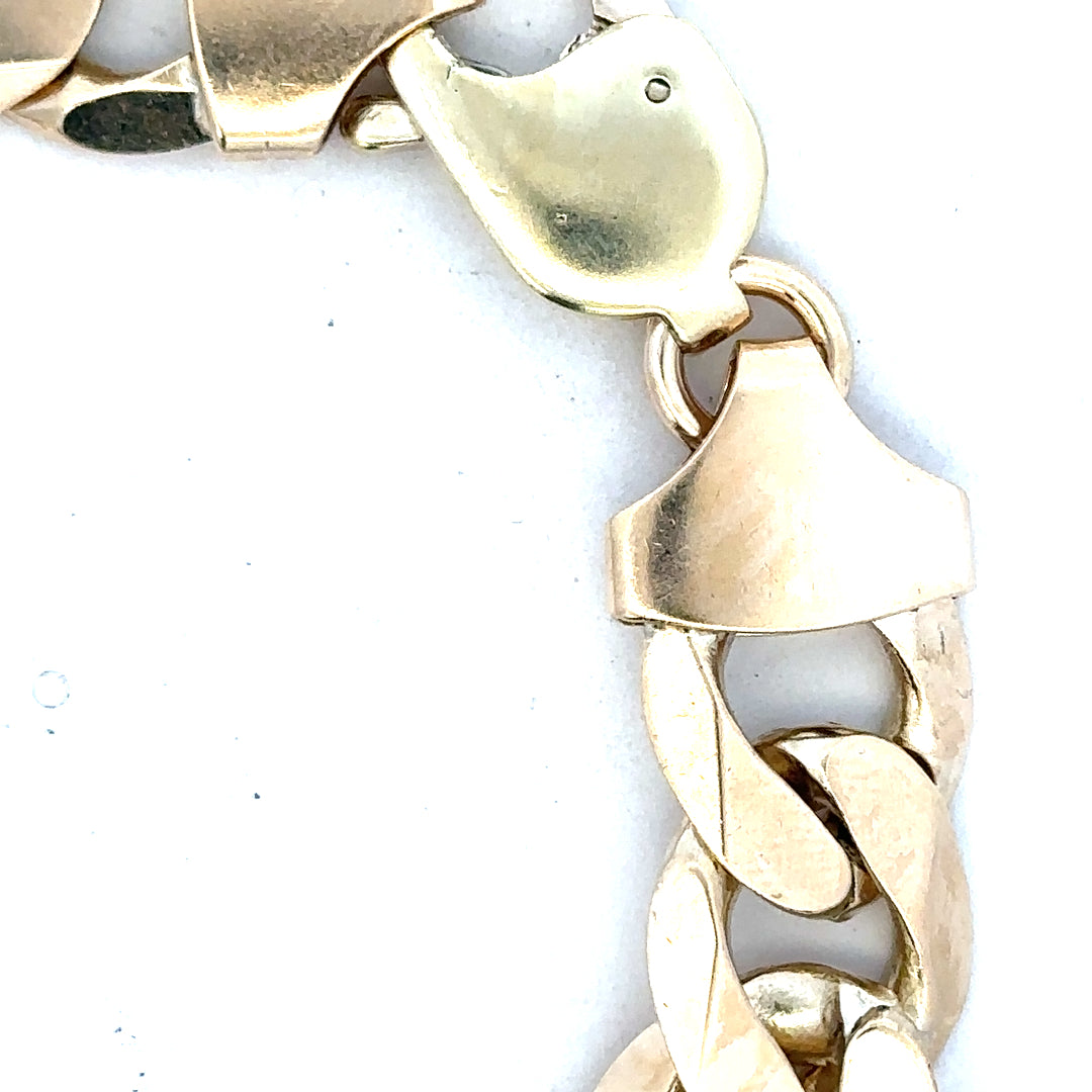 9ct yellow gold curb bracelet weighing 55g, unbranded, with a classic linked chain design visible in the image.