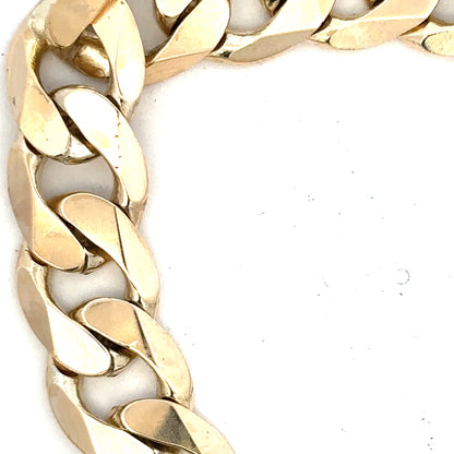 9ct yellow gold curb bracelet weighing 55g, unbranded, with a classic linked chain design visible in the image.