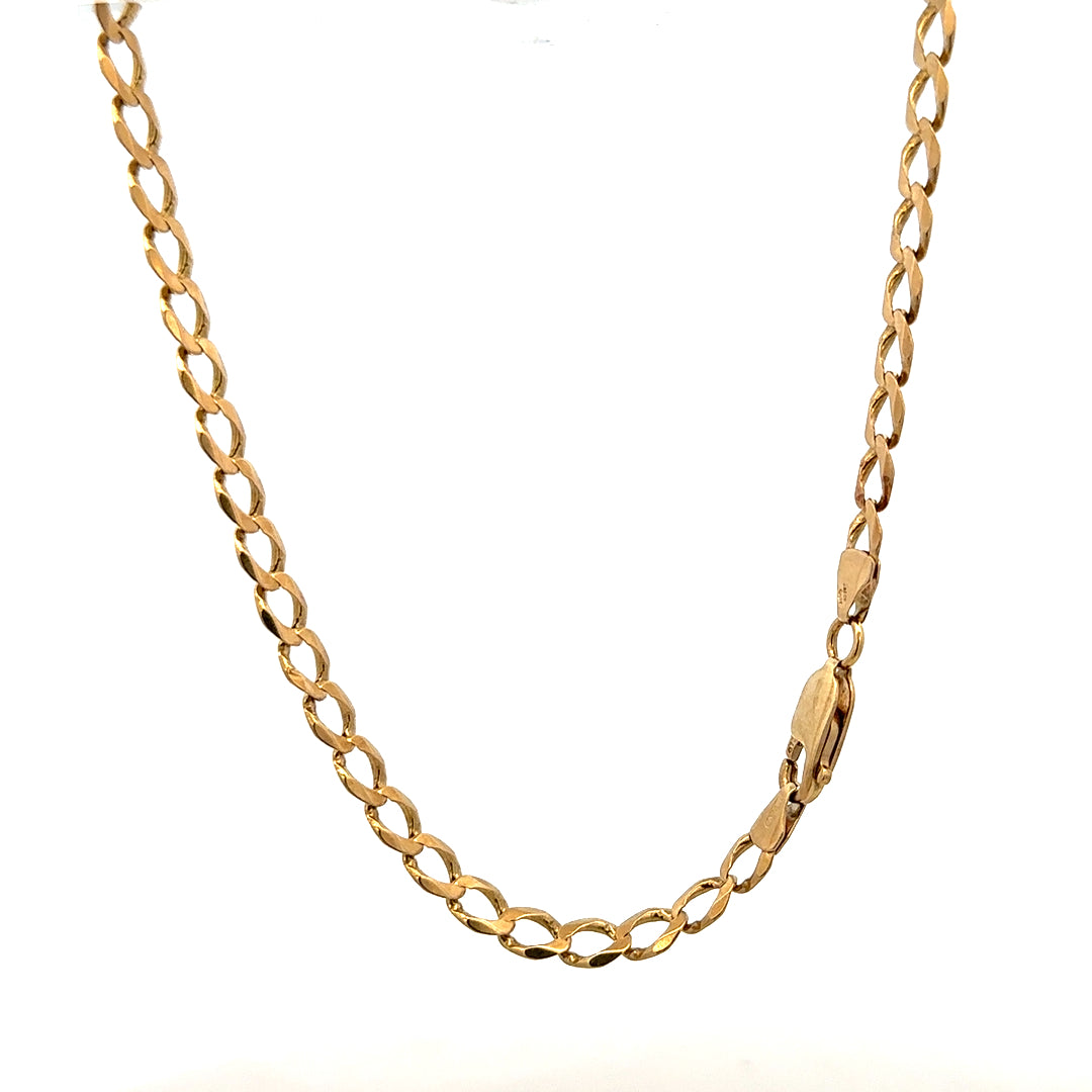 9ct yellow gold curb bracelet weighing 7.6g, unbranded, showcasing a classic link design on a plain background.