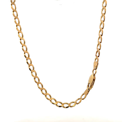 9ct yellow gold curb bracelet weighing 7.6g, unbranded, showcasing a classic link design on a plain background.
