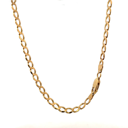 9ct yellow gold curb bracelet weighing 7.6g, unbranded, showcasing a classic link design on a plain background.