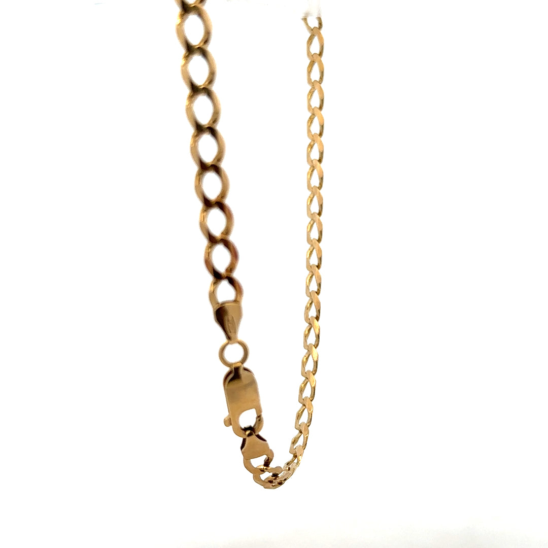 Yellow gold curb bracelet, unbranded, 7.6g, featuring interlinked, polished gold curb chain design.