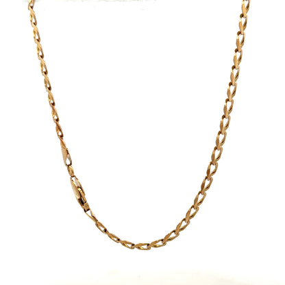 9ct yellow gold curb bracelet weighing 7.6g, unbranded jewelry accessory with classic chain design, shown in close-up view.