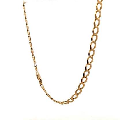 9ct yellow gold curb bracelet with a polished finish, weighing 7.6g, featuring classic linked chain design.