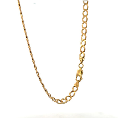 9ct yellow gold curb bracelet with a polished finish, weighing 7.6 grams, featuring classic linked chain design.