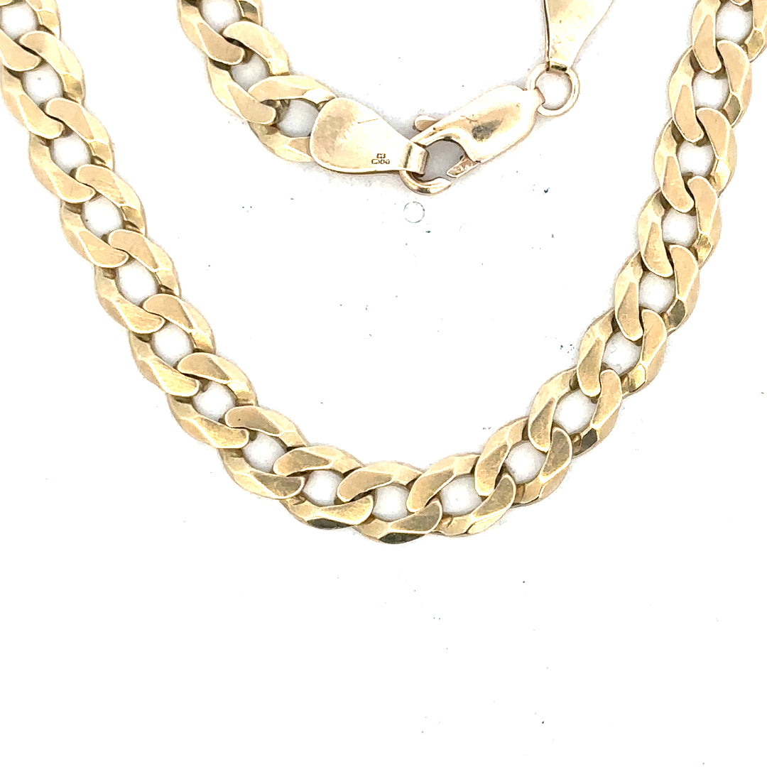 9ct yellow gold curb bracelet weighing 8.3g, unbranded, featuring classic linked design, shown in this image.