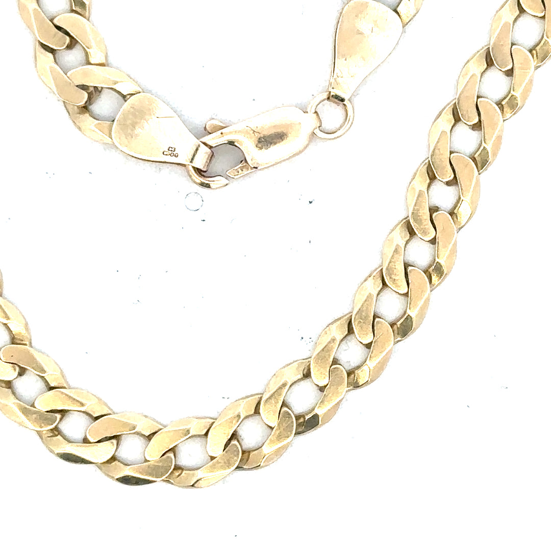 9ct yellow gold curb bracelet weighing 8.3g, unbranded, with classic linked chain design and secure clasp.