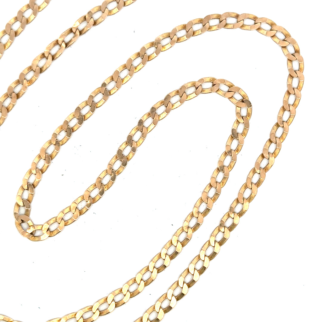 9ct yellow gold curb chain weighing 11.5g, unbranded jewelry chain with a classic curb link design, shown in close-up.