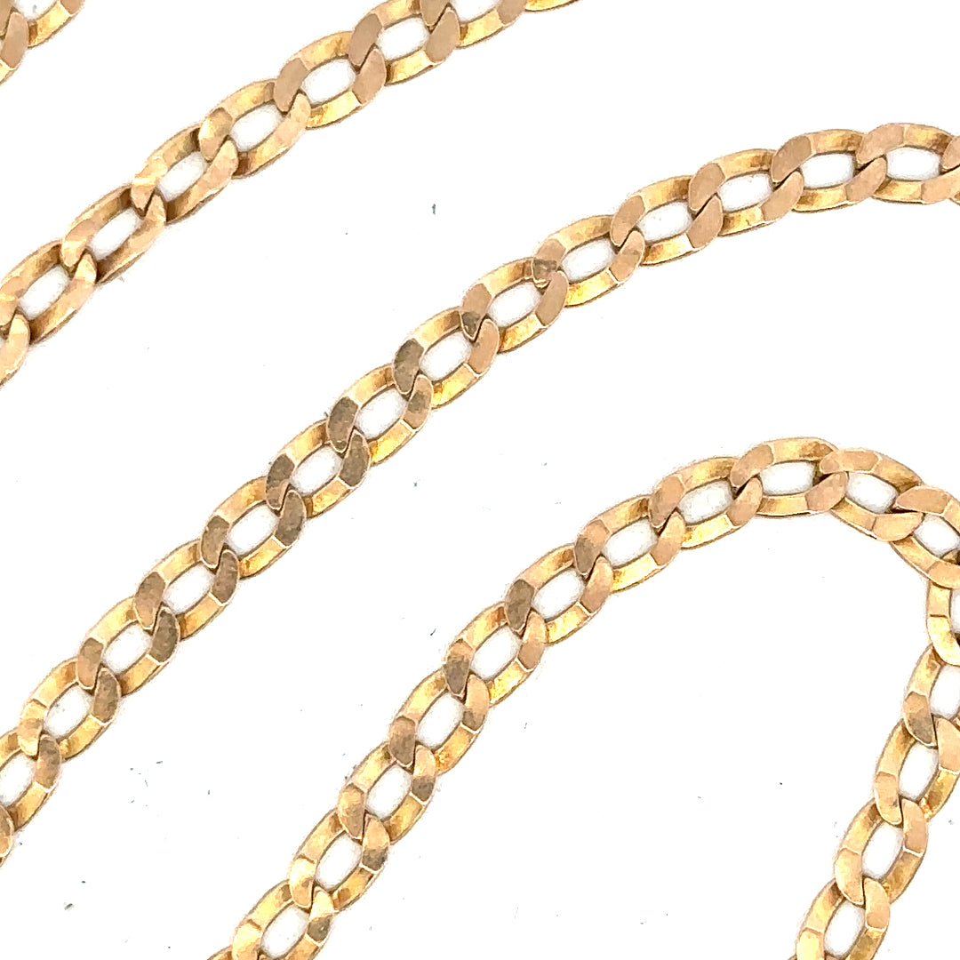 9ct yellow gold curb chain weighing 11.5g, unbranded jewelry chain with a classic curb link design.