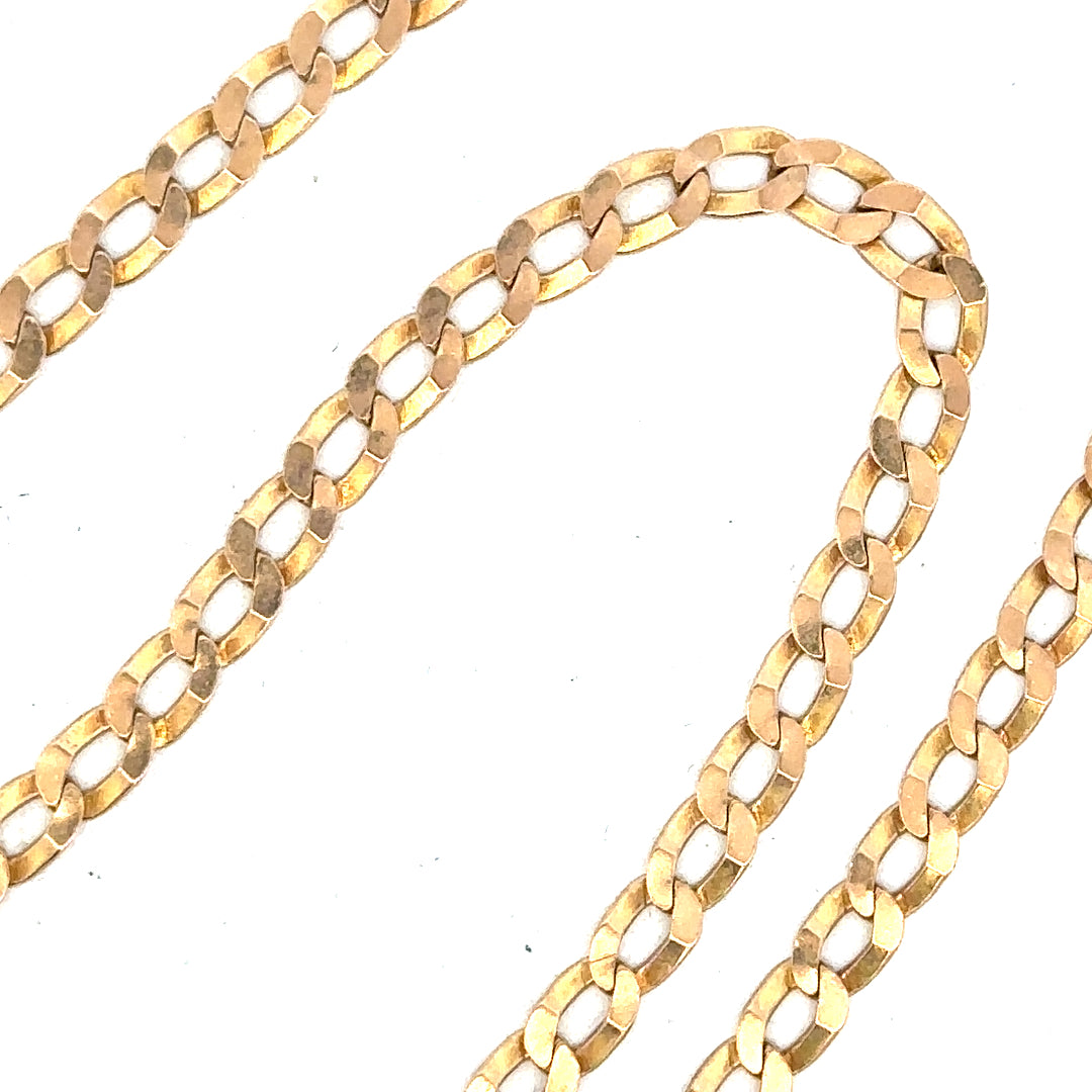 9ct yellow gold curb chain weighing 11.5g, unbranded jewelry chain with a classic curb link design.