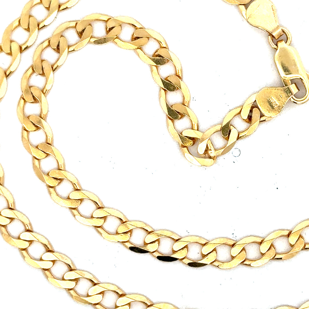 9ct yellow gold curb chain weighing 14.7g, unbranded jewelry chain with a classic curb link design.