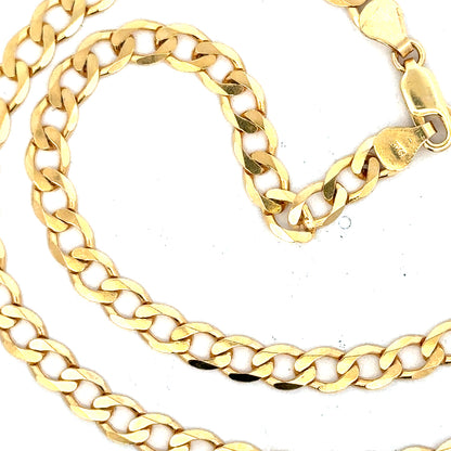 9ct yellow gold curb chain weighing 14.7g, unbranded jewelry chain with a classic curb link design.