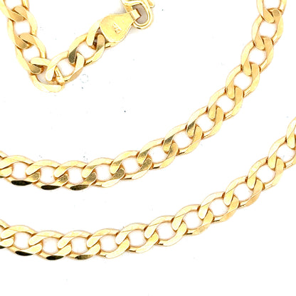 9ct yellow gold curb chain weighing 14.7g, unbranded jewelry chain with classic curb link design.