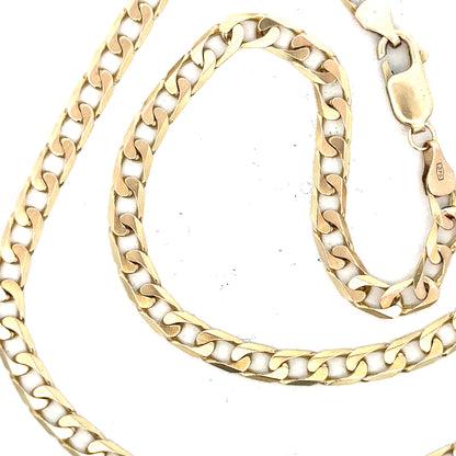 9ct yellow gold curb chain weighing 15.9g, unbranded jewelry with a classic linked design, shown on a plain background.