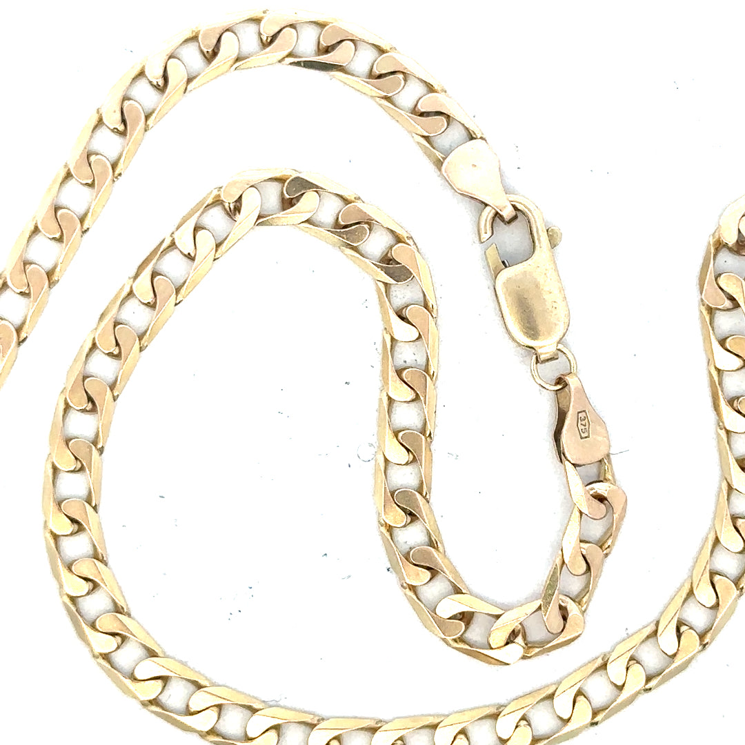 9ct yellow gold curb chain weighing 15.9g, showcasing a classic jewelry chain with a polished finish.